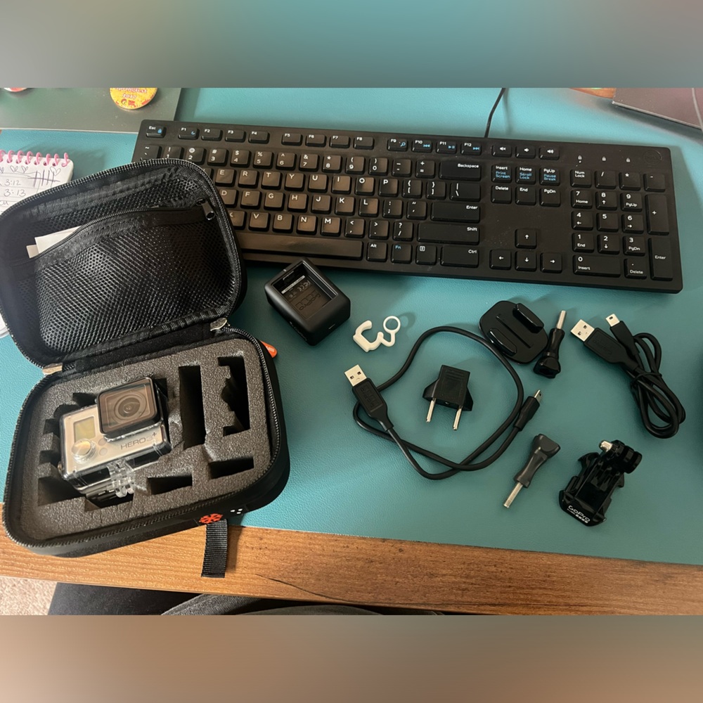 GoPro hero 3 plus silver edition with waterproof case and accessories .